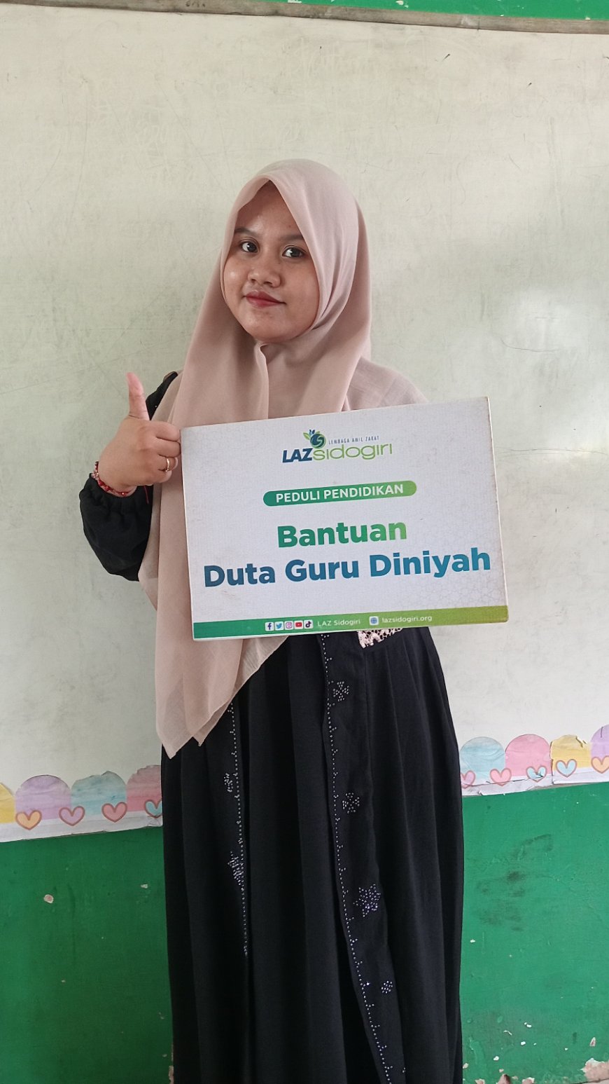 LAZ SIDOGIRI SALURKAN BANTUAN UNTUK GURU MID TARBIYATUL ATFAL DI SOCAH BANGKALAN