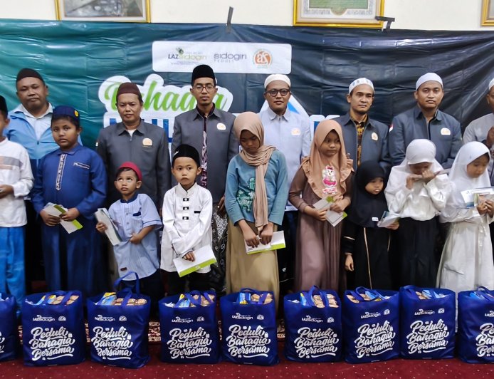 LAZ SIDOGIRI HADIRKAN SENYUM YATIM LEWAT BAHAGIA MUHARRAM DI AMPEL